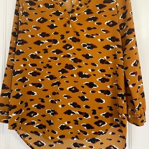 Leopard print tunic blouse. Size Medium